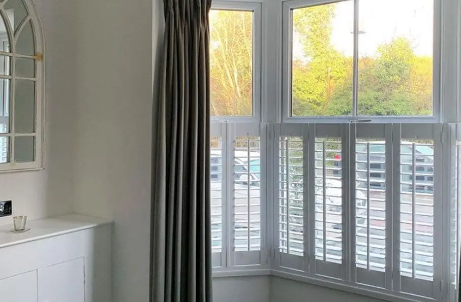 white cafe style shutters