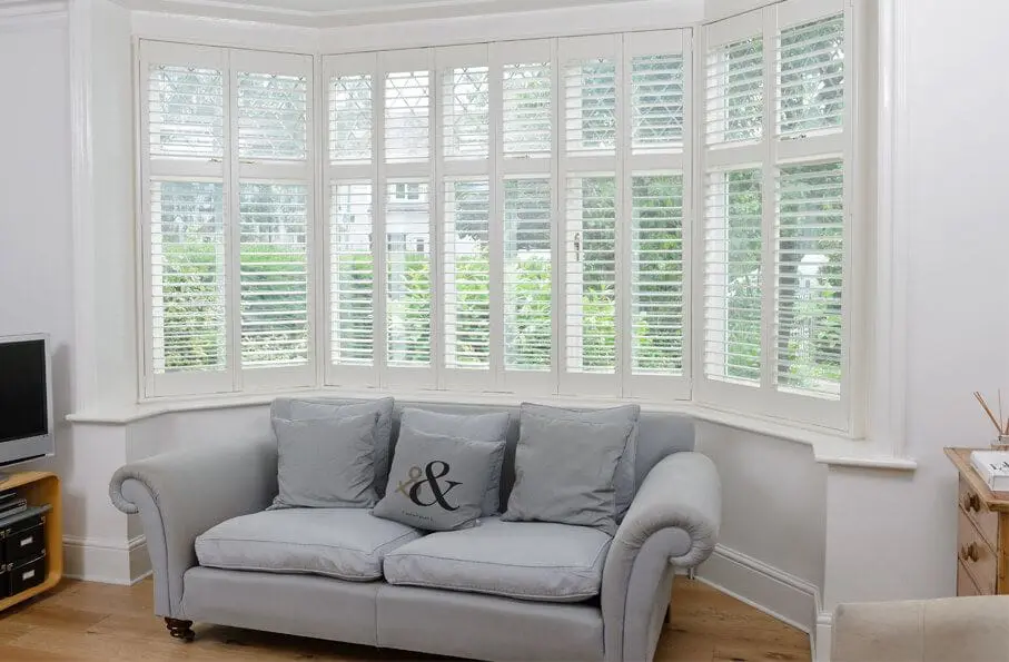 white bay window shutters
