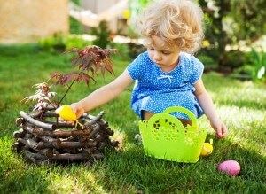 girl collecting easter eggs