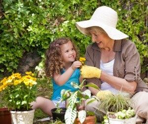 grandmother and child gardening