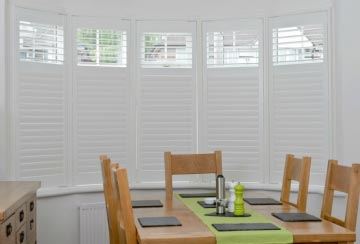dining-room-interior-woth-wooden-bay-window-shutter dining-room-interior-woth-wooden-bay-window-shutter