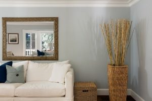 sofa next to wicker