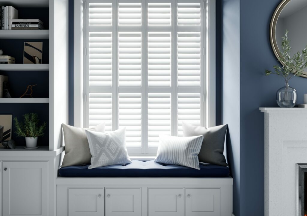 white shutters and blue bench