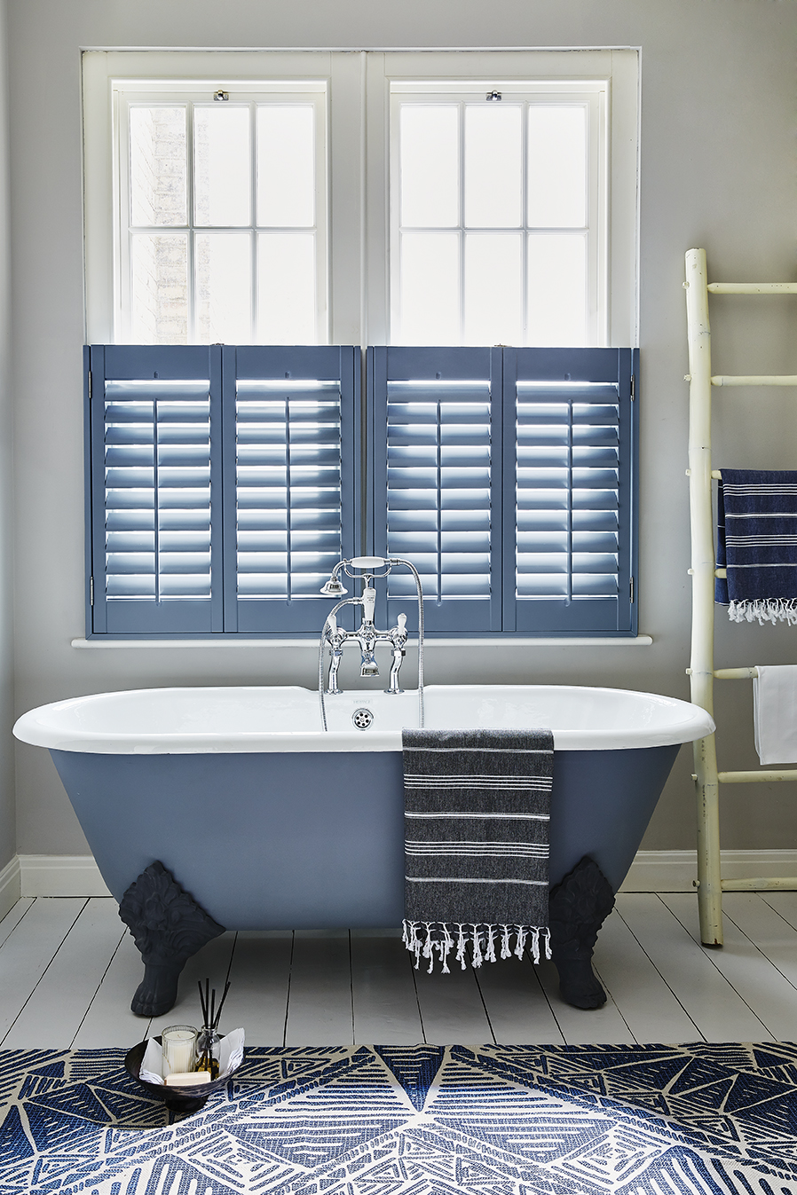 cafe style shutters in a bathroom 