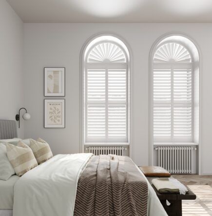 Full height special shape window shutters in bedroom