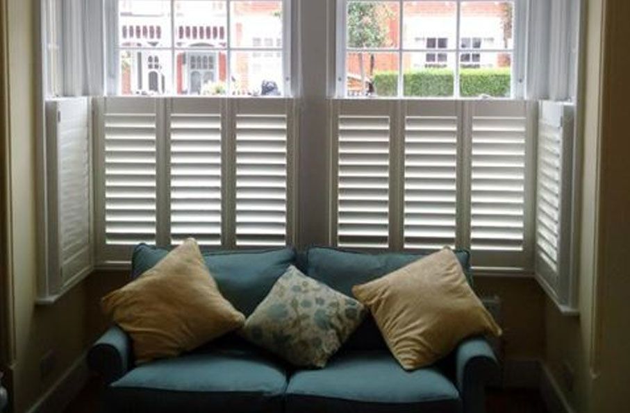 white cafe style shutters
