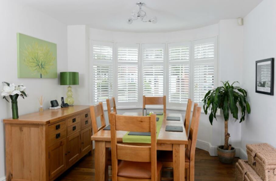 white bay window shutters