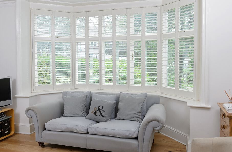 white bay window shutters