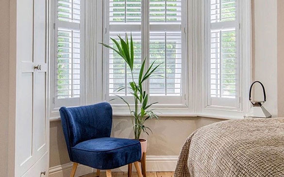 white bay window shutters