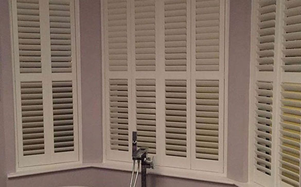 white bay window shutters