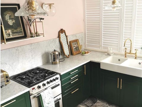 Fresh white shutters at a kitchen window