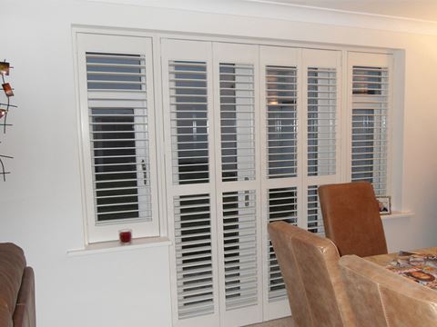 white door and window patio shutters