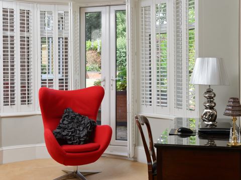 white patio shutters with french door