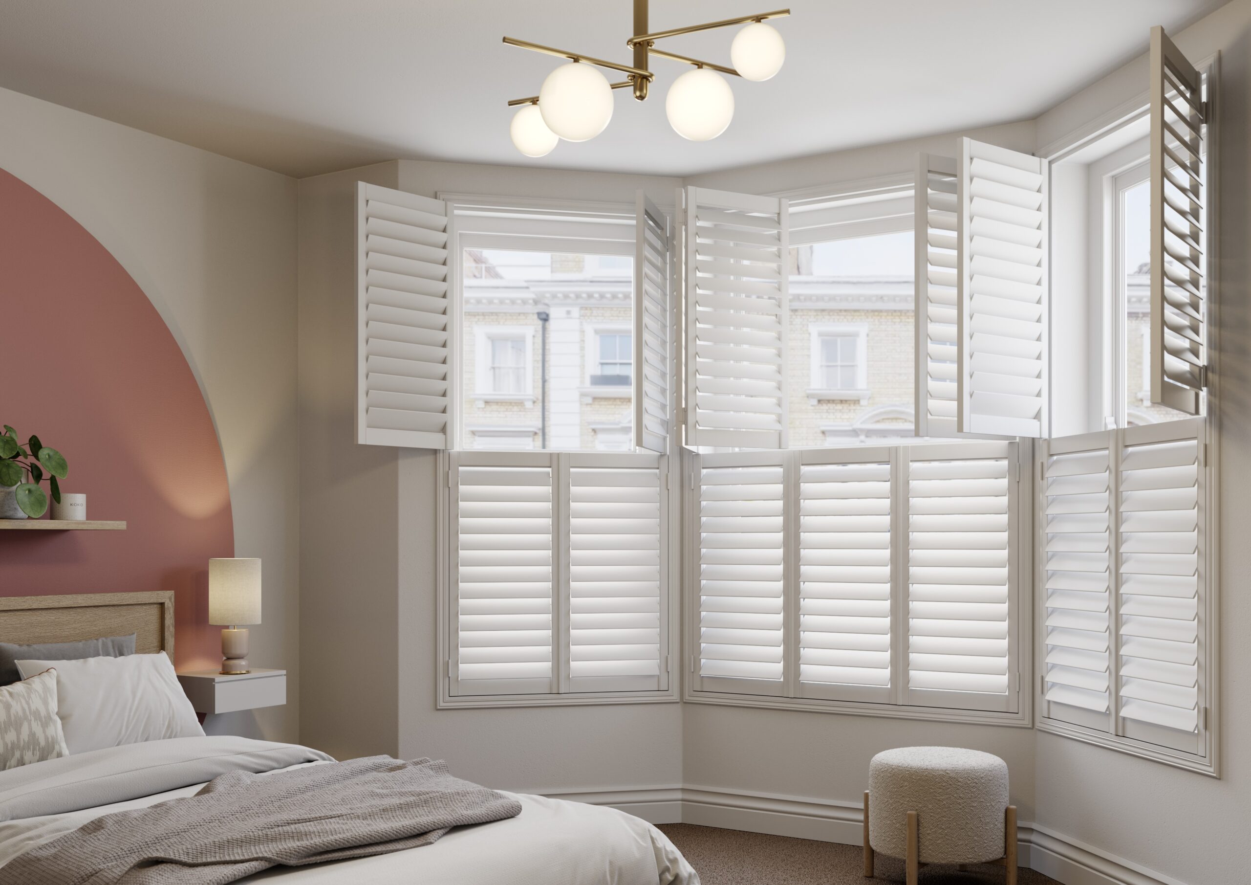 white tier on tier shutters in bedroom 